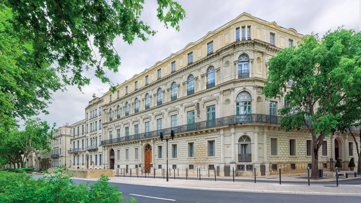 Investissement immobilier ancien rénové : Programme Nîmes Arènes situé à NIMES (30000), éligible au dispositif LMNP résidence services.